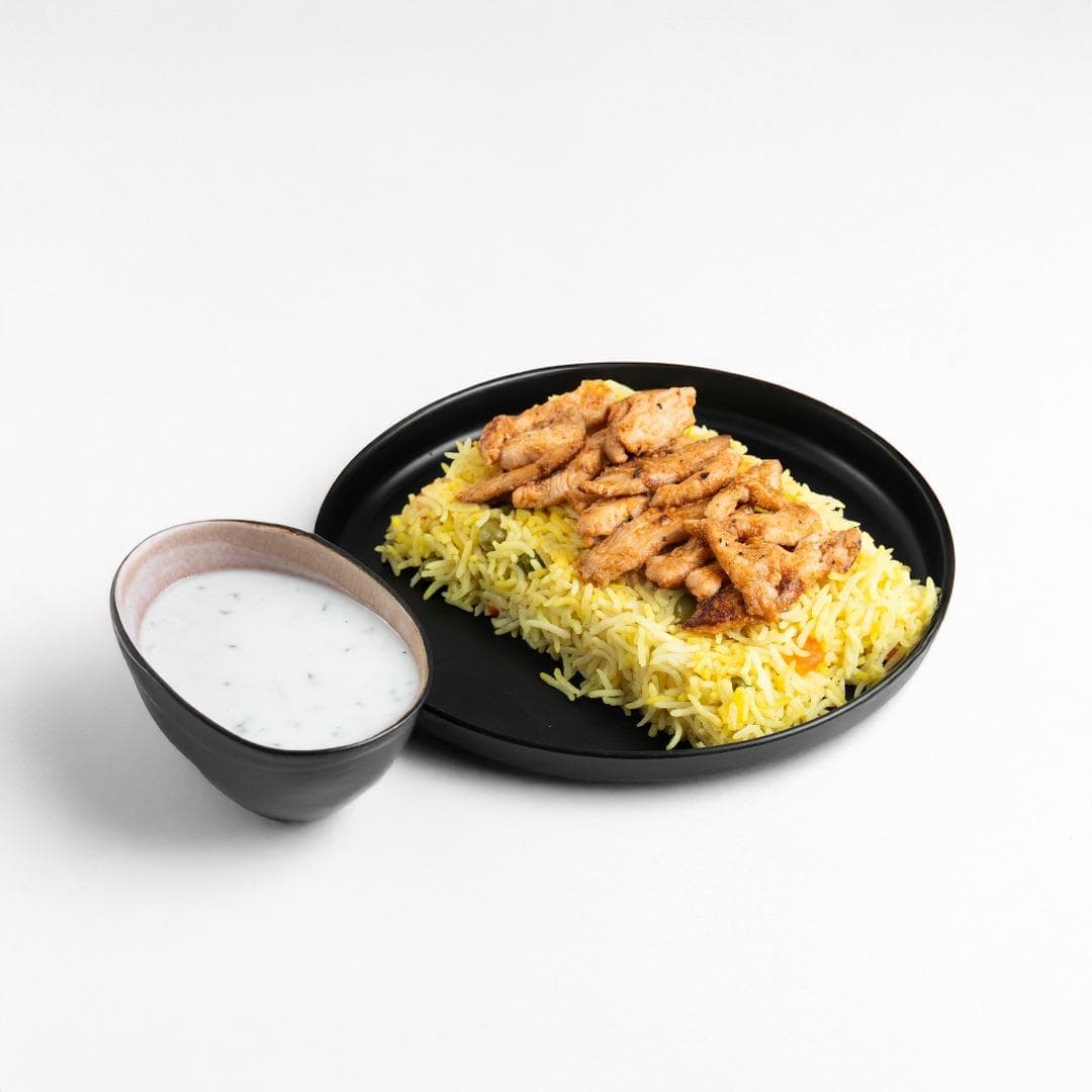Peri Peri Chicken with Yellow Rice with Yogurt Sauce