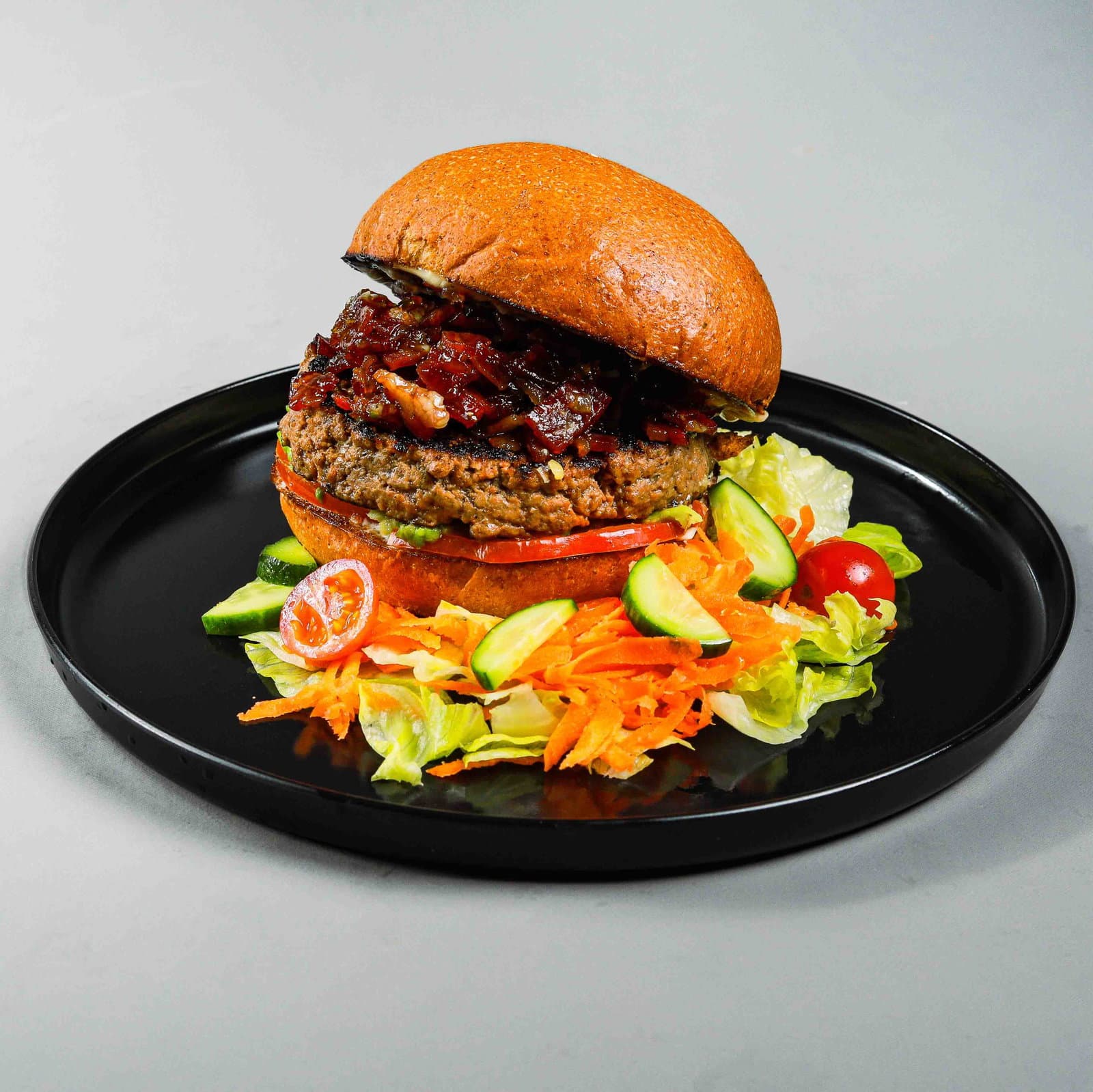 Maple beef bacon jam burger with side salad